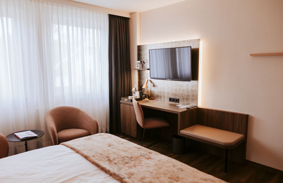 Fernsehbereich im Zimmer Lys
